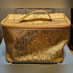 Gold Calvin Klein Makeup Travel Case Previously owned